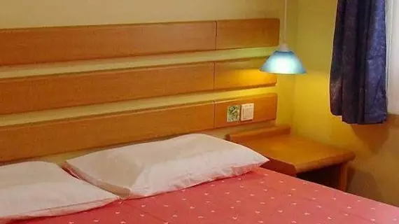 Home Inn | Sişuan - Liangshan Yi Özerk İli - Xichang