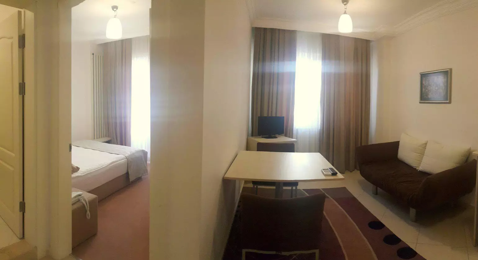 Kamer Suite & Hotel